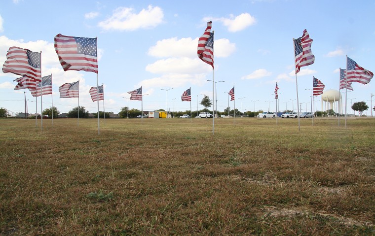 Flags Placed at Future Nov. 5 Memorial Site